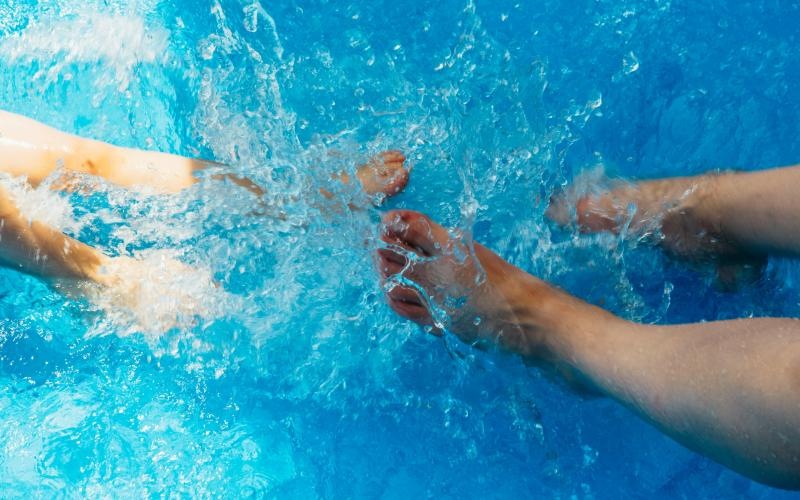 a group of people in a pool