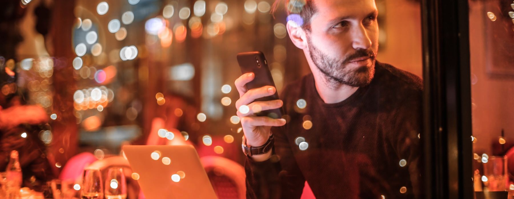a man holding a phone