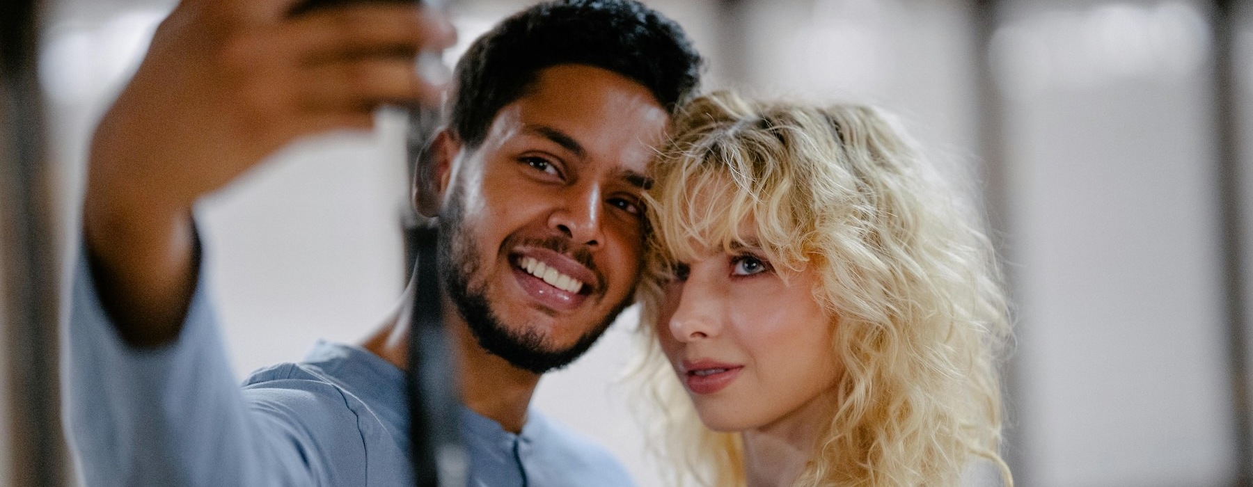 a man and woman smiling
