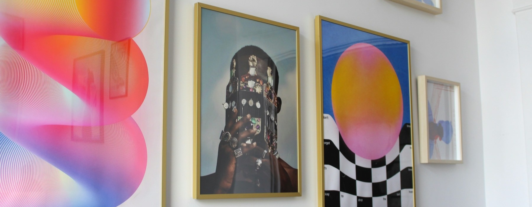 a wall with pictures on it